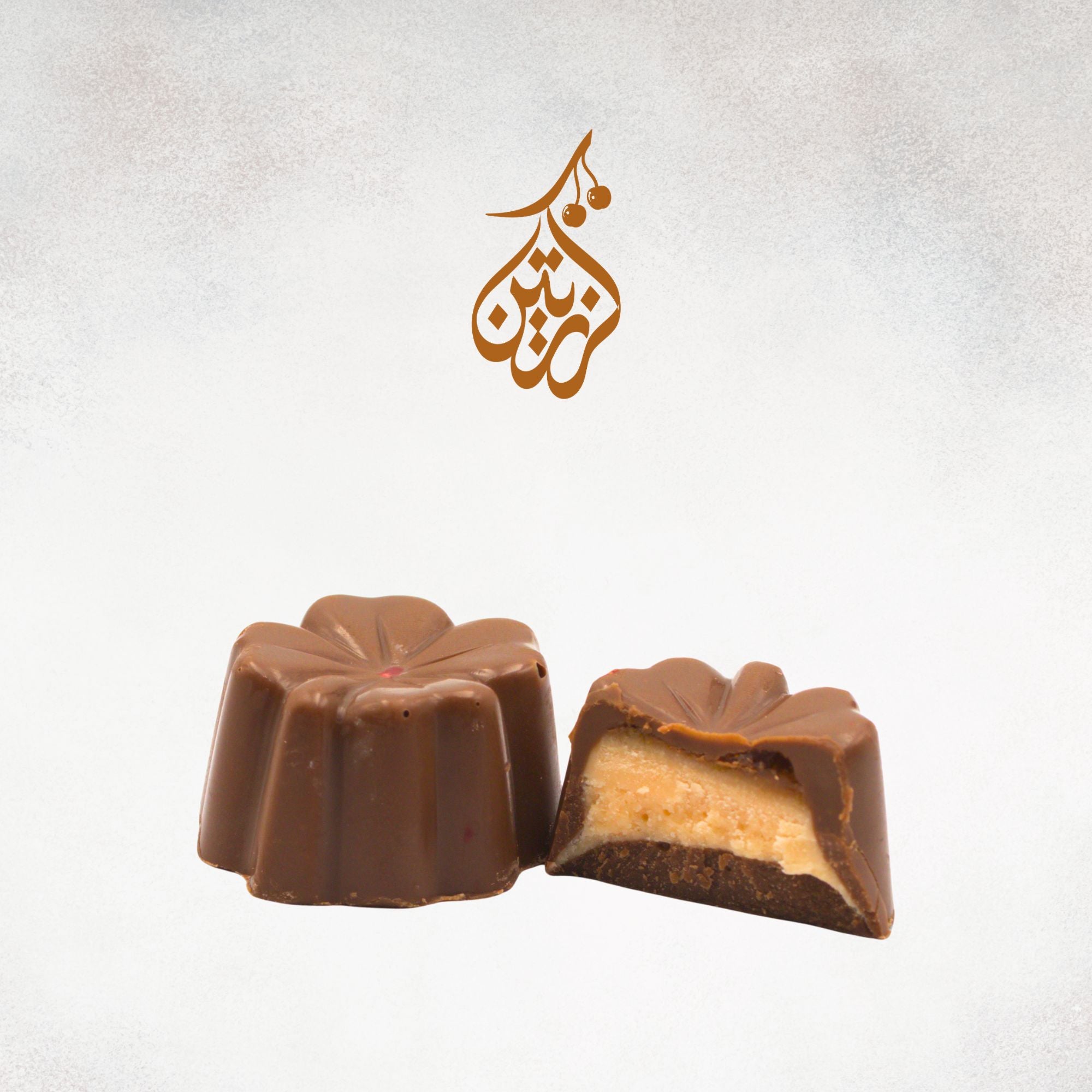 A piece of fine Belgian chocolate filled with orange cream.