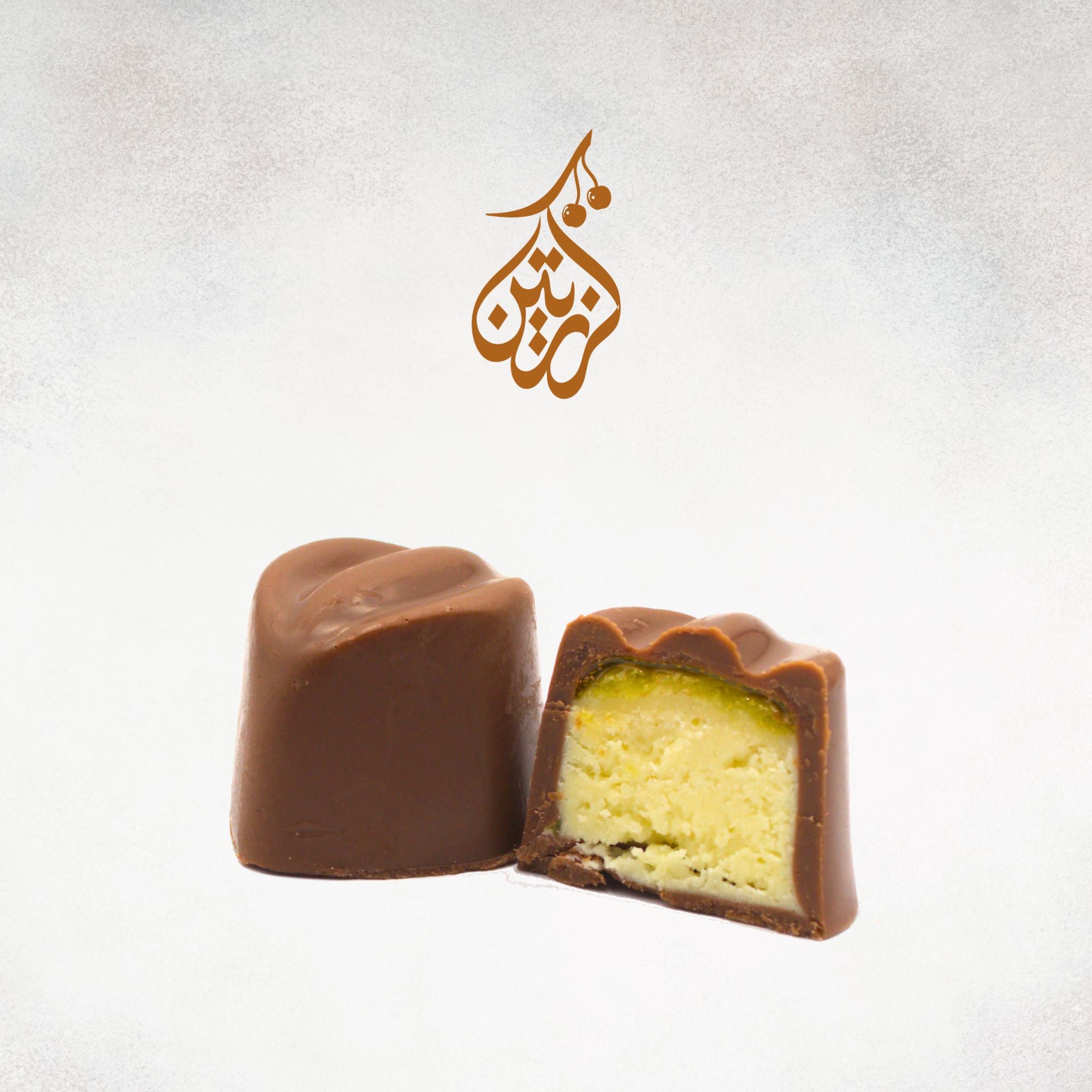 A piece of luxurious Belgian chocolate candy filled with passion fruit.